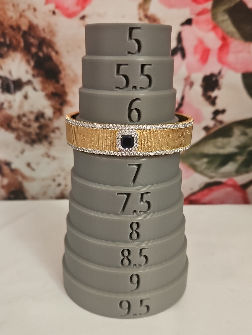 Gold Textured Bracelet with Blue Center Stone by